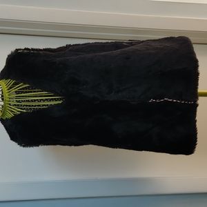 Woman's fur vest fabric lining snap front closure